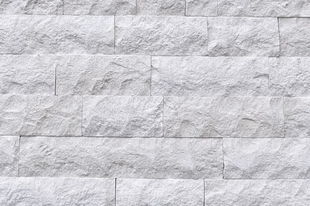 Textura das peças de Rock Face Limestone, tom claro e uniforme