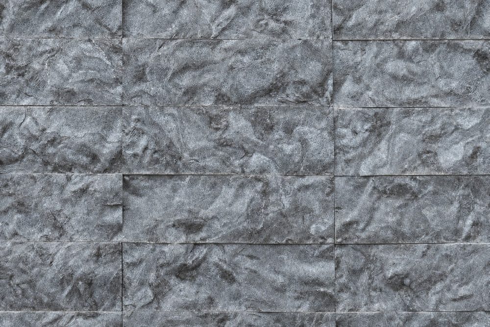 Textura das peças de Rock Face Matrix, com relevo geométrico