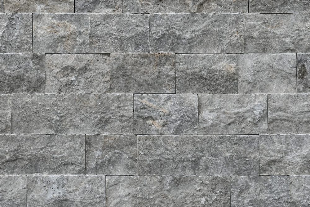 Textura das peças de Rock Face Travertino Silver
